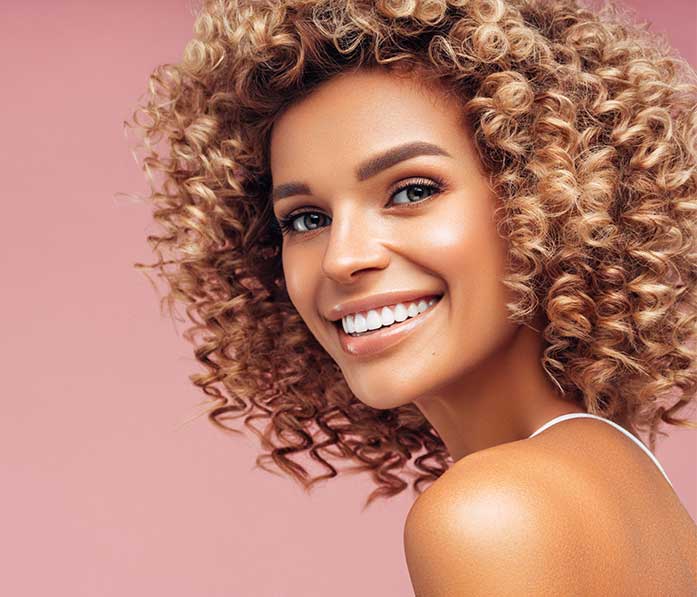 Young woman getting facial fillers