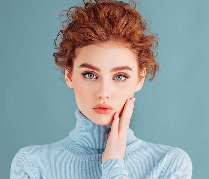 Young woman looks at the camera