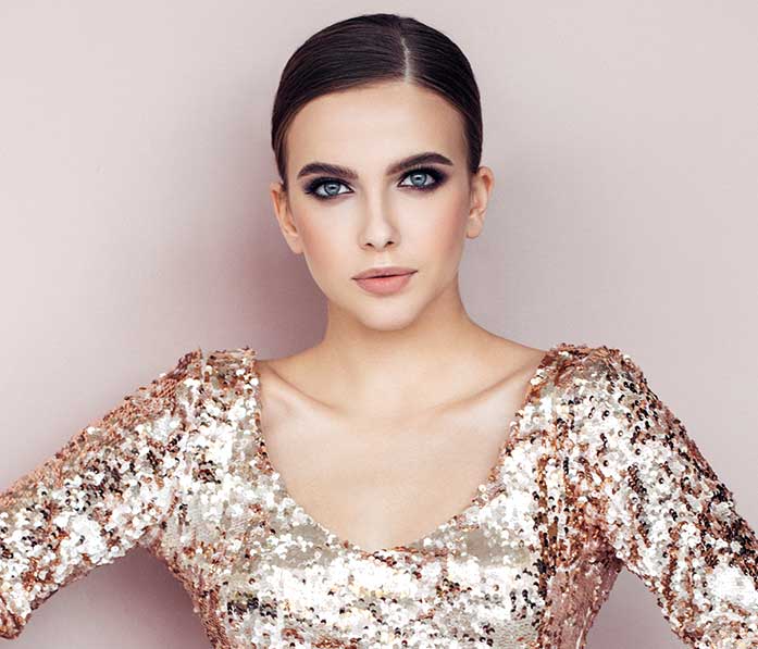 Young woman looks at camera